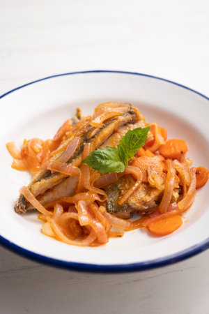 Pickled horse mackerel with carrot and onion.の写真素材