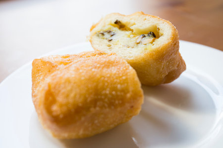 Pirozhki are stuffed rolls typical of Russian, Belarusian, and Ukrainian cuisines. They can be baked or fried with yeast. Their fillings are made of meat or vegetables.の写真素材