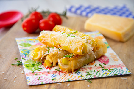 Cannelloni made with brick pasta stuffed with chicken and cheese.