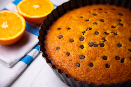 Spongecake with orange and chocolate chipsの写真素材