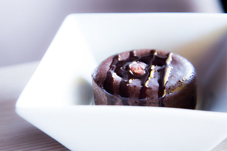 Coulant. Molten chocolate cake is a popular dessert that combines the elements of a flourless chocolate cake and a souffle. Other names used are chocolate lava cake and chocolate vの写真素材