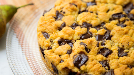 Pear and chocolate crumble. The crumble is a cake with fruits. It is made with various fruits that...