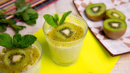 Kiwi mousse. A mousse is a dessert of French origin, whose base is egg white mounted until stiff, or whipped milk cream, which gives it a spongy consistency.の写真素材