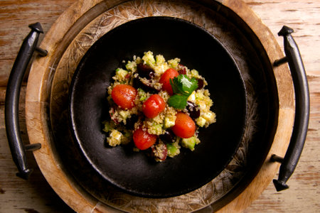 Delicious salad with quinoa and vegetables.の写真素材