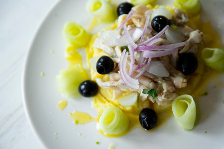 Delicious and healthy salad with razor clams and cucumber.