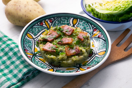 The trinxat de la Cerdanya is a typical Catalan dish that looks like a small tortilla mixed with cabbage, pork belly and potato.の写真素材