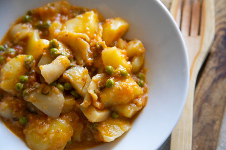 Stewed cuttlefish with potatoes. Traditional Spanish tapas recipe.の写真素材