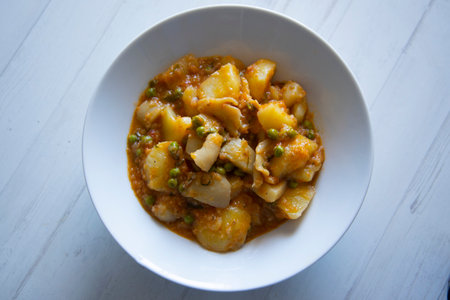 Stewed cuttlefish with potatoes. Traditional Spanish tapas recipe.の写真素材
