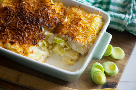 Baked leek pie gratin with cheese.の写真素材