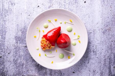 Red piquillo peppers stuffed with bechamel and vegetables.の写真素材