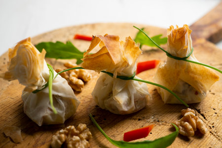 Oven-baked filo pastry vegetable packets.