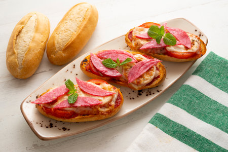 Salami panini with cheese. Italian appetizer.の写真素材