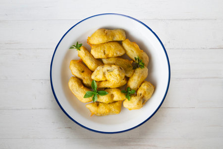 Dish with battered artichokes. Traditional Spanish cover.の写真素材