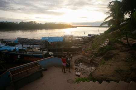 Yurimaguas, Peru 1st October 2022: Community of fishermen unloading fish from their boats on the...