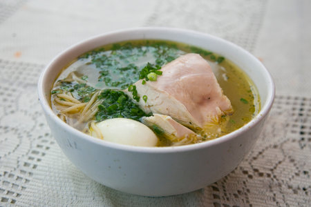Chicken soup. Chicken broth is a traditional dish of Peruvian gastronomyの写真素材