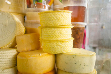 Top quality Peruvian organic cheeses in a market stall in the city of Cusco, Peru.の写真素材