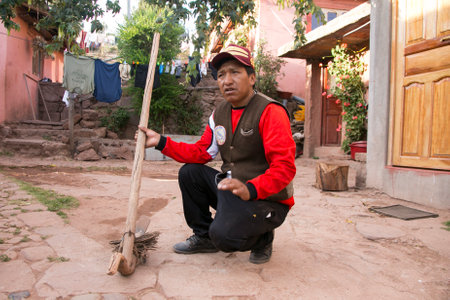 Llachon, Peru; 1st January 2023: Local farmer and his wife in Llachon peninsula in Titicaca Lake.のeditorial素材