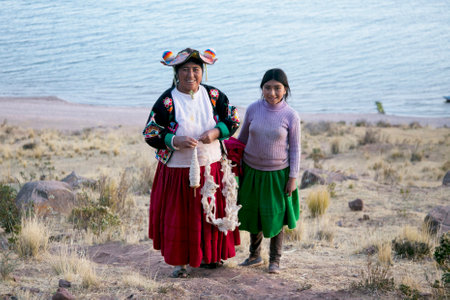 Llachon, Peru; 1st January 2023: Local people from the Llachon peninsula province on Lake Titicaca...