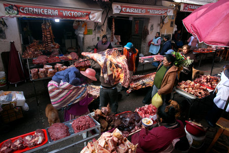 Cusco, Peru; 1st January 2023: Stall selling meat in the central market of Sant JerÃ³nimo de Cusco in Peru.のeditorial素材