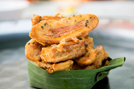 Fried banana in a street food stall in the city of Bangkok in Thailand..の写真素材