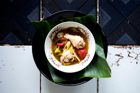 Tom Yum soup ready to serve after all the ingredients have been cooked for 2 hours.の写真素材