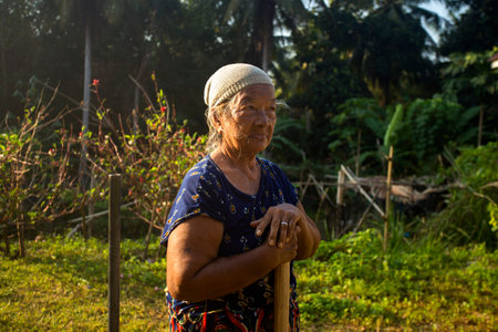 Koh Yao, Thailand; 1st January 2023: Elderly people in a fishing village on the island of Koh Yao in southern Thailand.のeditorial素材