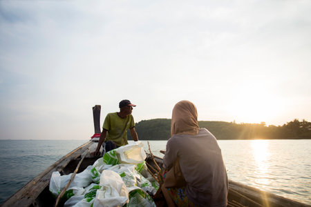 Koh Yao, Thailand; 1st January 2023: Thai fisherman in his boat in the Andaman Sea.のeditorial素材