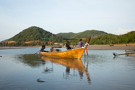 Koh Yao, Thailand; 1st January 2023: Fishermen fixing their long Tail boats in the fishing village of Koh Yao.のeditorial素材