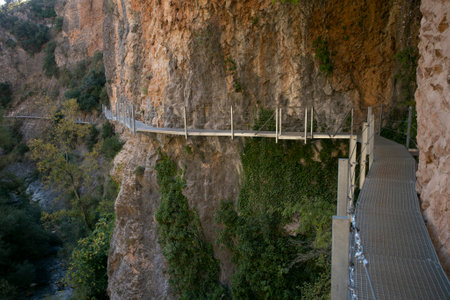 Route of the footbridges, AlquÃ©zar. Beautiful route across the river crossing metal walkways and nature trails through the mountain.の写真素材
