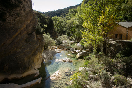 Route of the footbridges, AlquÃ©zar. Beautiful route across the river crossing metal walkways and nature trails through the mountain.の写真素材