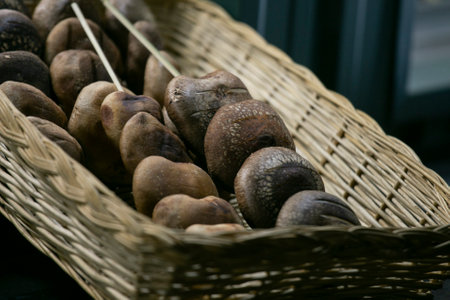 Japanese Shiitake mushrooms cooked tomato sauce at a street food stand in Tokyo.の写真素材