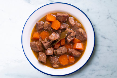 Beef stew with carrots. Traditional tapa from the central area of Spain.の写真素材