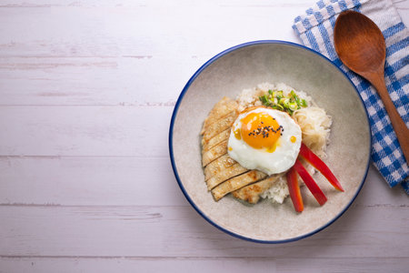 Teriyaki chicken donburi with fried egg,の写真素材