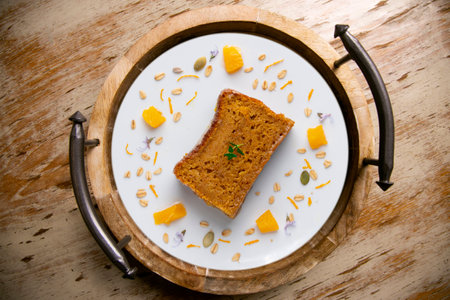 Delicious vegan carrot and tangerine sponge cake with ground almonds.の写真素材