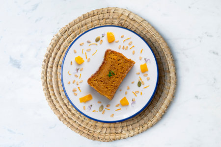 Delicious vegan carrot and tangerine sponge cake with ground almonds.の写真素材