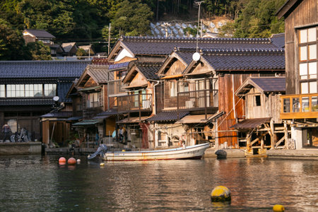 Beautiful fishing village of Ine in the north of Kyoto. Funaya or boat houses are traditional wooden houses built on the seashore.の写真素材