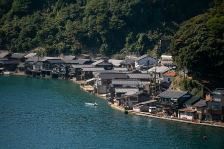 Beautiful fishing village of Ine in the north of Kyoto. Funaya or boat houses are traditional wooden houses built on the seashore.の写真素材
