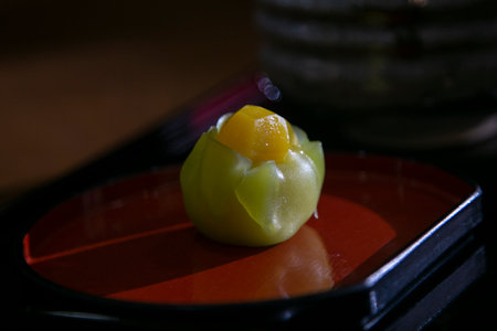 Wagashi is a traditional Japanese sweet often served with tea, made primarily with mochi, anko, and fruit.の写真素材