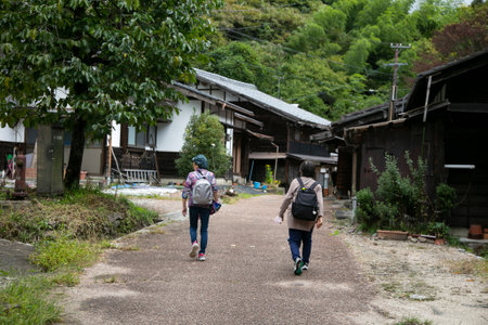 Magome, Japan; 1st October 2023: Walking the hiking road following the Nakasendo trail between Tsumago and Magome in Kiso Valley, Japan.のeditorial素材