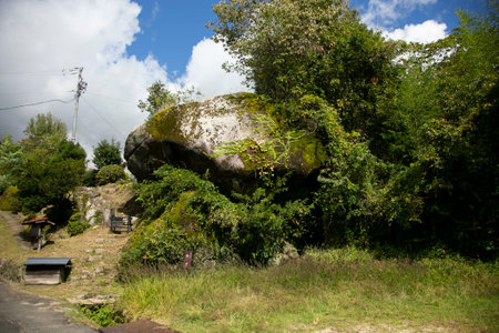 Walking the road following the Nakasendo trail between Nagiso and Tsumago in Kiso Valley, Japan.の写真素材