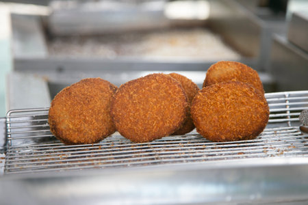 Japanese croquette called korokke in Yanaka street food market.の写真素材