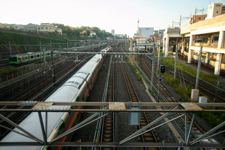 Tokyo, Japan; 1st October 2023: Trains passing through Nippori train station in Tokyo.のeditorial素材
