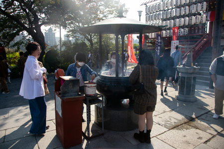 Festive atmosphere at the entrance to the Zoo in Tokyo's Ueno Park on an autumn Sunday.のeditorial素材