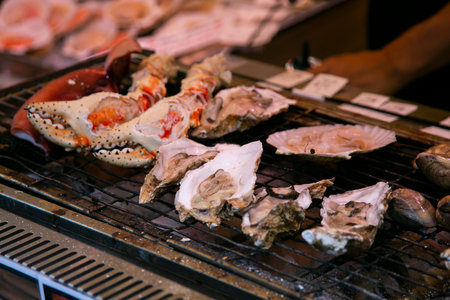 Seafood at a food stall at the Tsukiji Outer Market in the city of Tokyo, Japan.の写真素材
