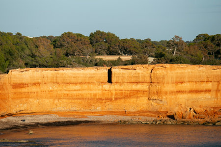 Sa Caleta beach in Ibiza. Beautiful beach with reddish rock and crystal clear waters on the island...