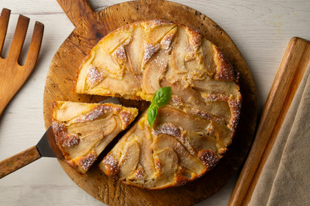 Sponge cake with pear and yogurt. Delicious traditional Italian recipe.