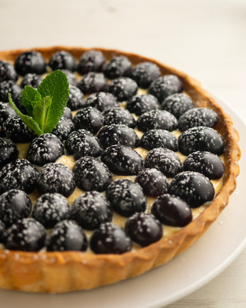 Pastry cream cake with grapes.の写真素材