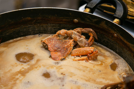 Japanese seafood and shrimp soup at a street food market in Osaka, Japan.の写真素材