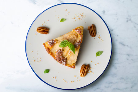 Delicious cake with fresh pears and raisins.の写真素材