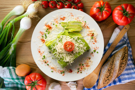 Baked potatoes with spinach bechamel and cheese.の写真素材
